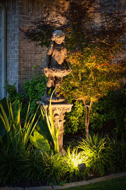 yard sculpture lit up 